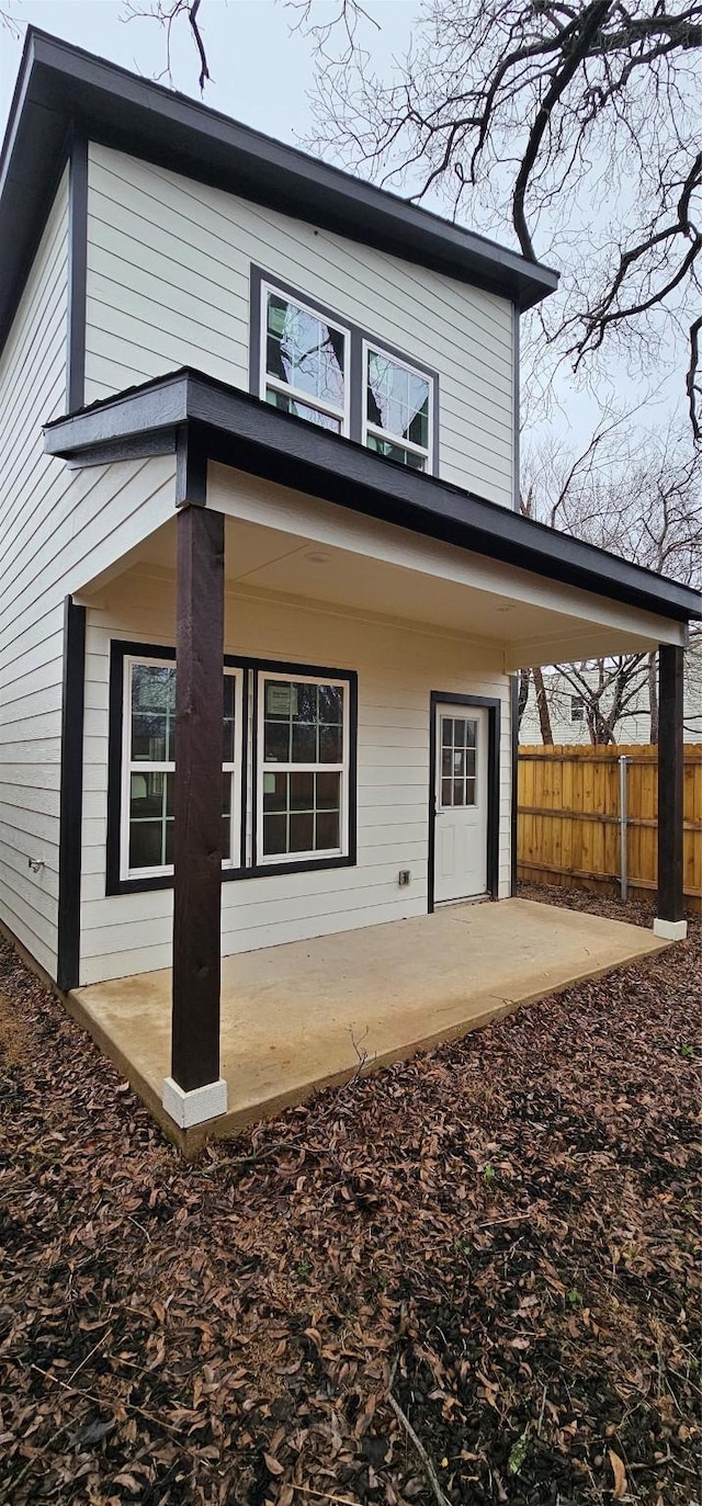 back of property with a patio area