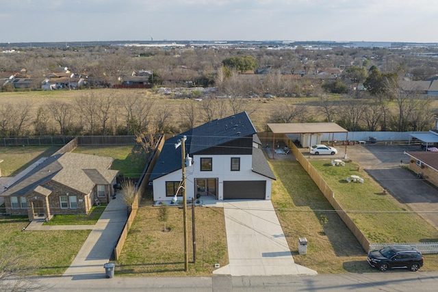 birds eye view of property with a residential view