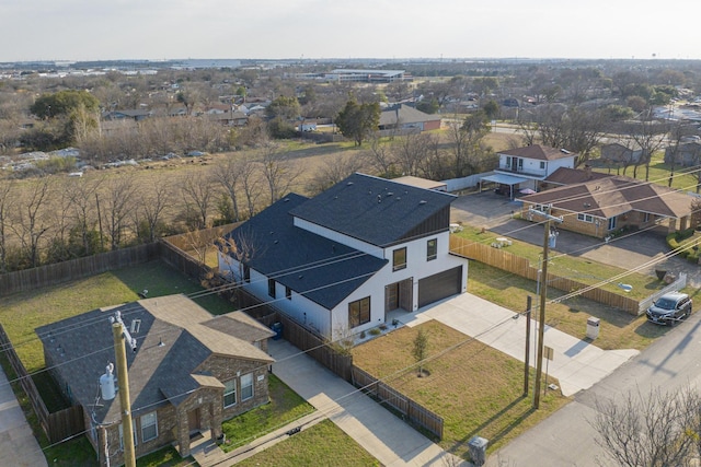 birds eye view of property with a residential view