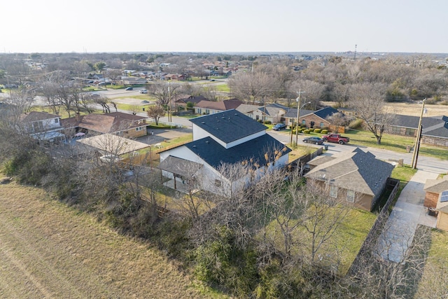 birds eye view of property with a residential view