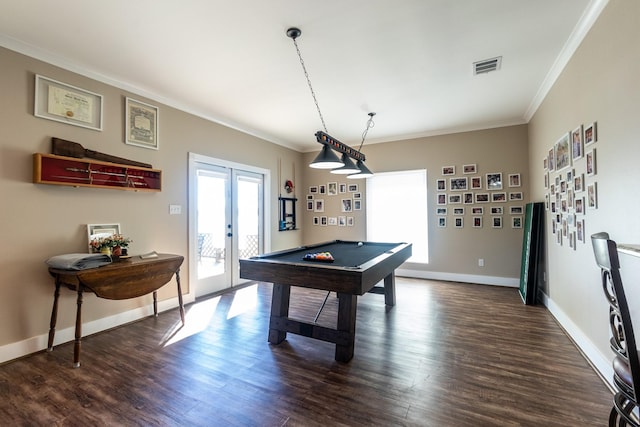 playroom featuring french doors, dark wood finished floors, crown molding, visible vents, and baseboards