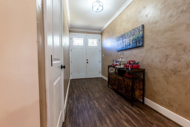 foyer entrance with dark wood-style floors, baseboards, and ornamental molding