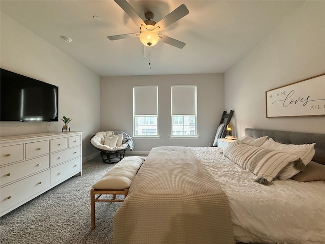 carpeted bedroom featuring a ceiling fan