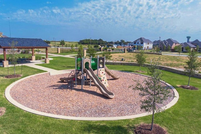 community playground with a lawn and a gazebo