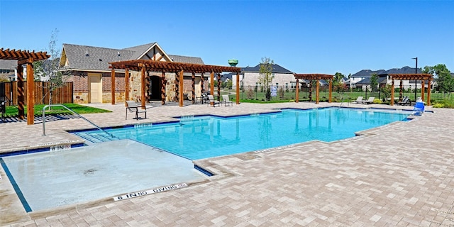 pool with fence, a patio, and a pergola