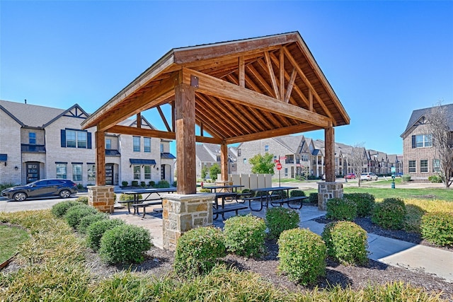 surrounding community with a residential view and a gazebo