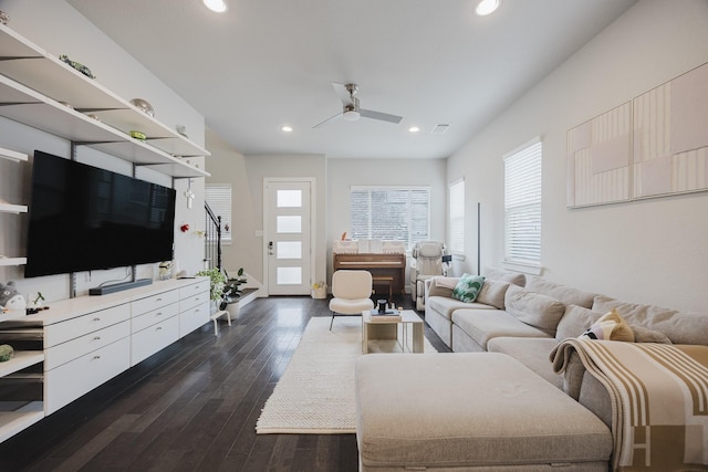 living area with dark wood-type flooring, recessed lighting, visible vents, and a ceiling fan