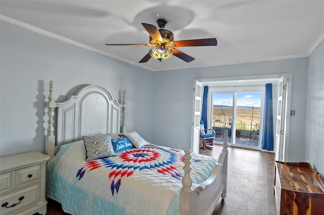 bedroom with hardwood / wood-style floors, crown molding, access to outside, and ceiling fan