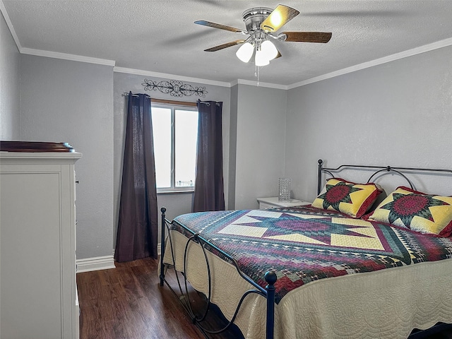 bedroom featuring crown molding, ceiling fan, dark hardwood / wood-style flooring, and a textured ceiling