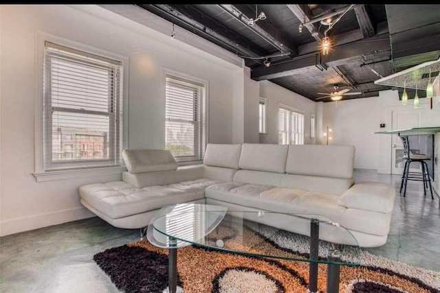 living room with concrete flooring