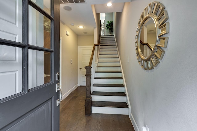 entrance foyer with dark hardwood / wood-style flooring