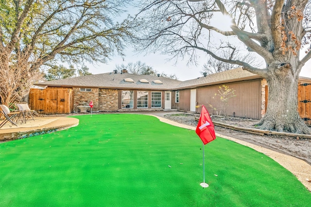 2261 Woodcreek, Carrollton, TX 75006 - rear view of house featuring a patio area