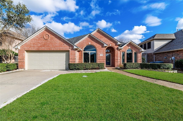 ranch-style home featuring a front lawn, a garage, brick siding, and driveway