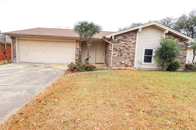 view of front of house with brick siding, an attached garage, concrete driveway, and a front lawn