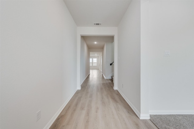 hall featuring light wood-type flooring