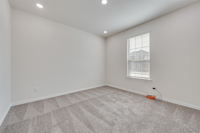 empty room with carpet flooring