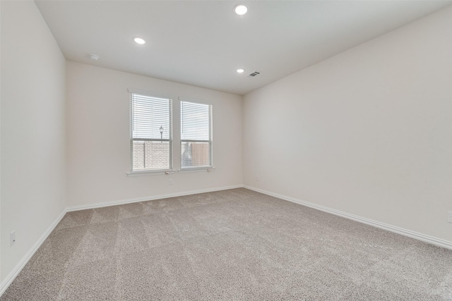 empty room with carpet floors