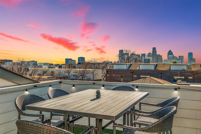 balcony at dusk with a skyline view