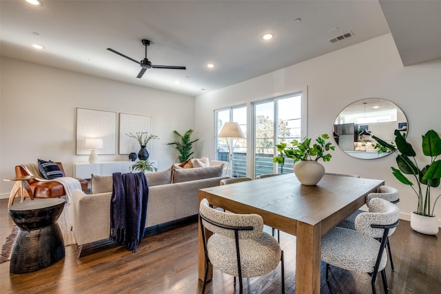 dining room with a ceiling fan, dark wood finished floors, recessed lighting, and baseboards