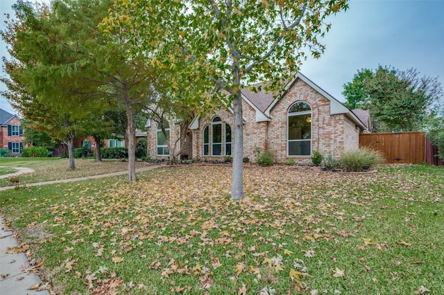 view of front of property with a front lawn