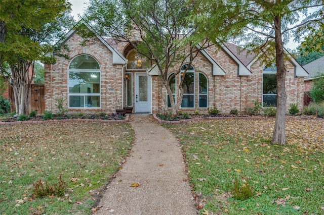 view of front of home with a front yard