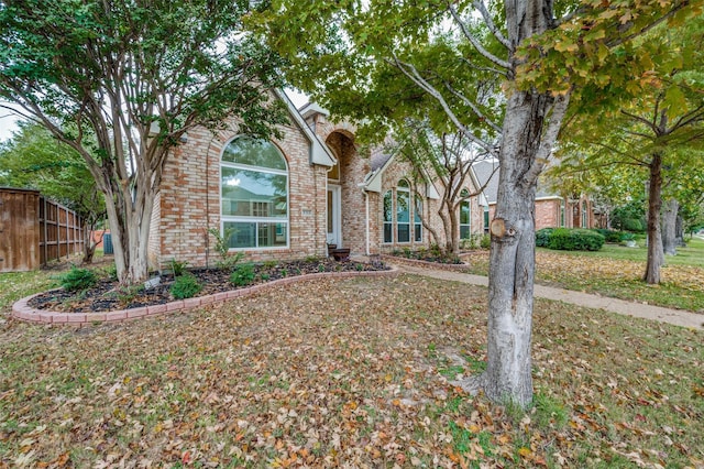 view of front of home with a front yard