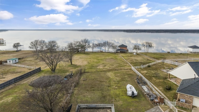 bird's eye view with a water view