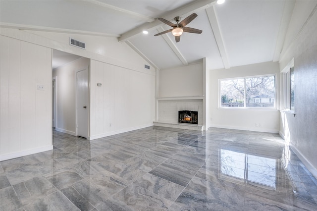 unfurnished living room featuring lofted ceiling with beams, a brick fireplace, and ceiling fan