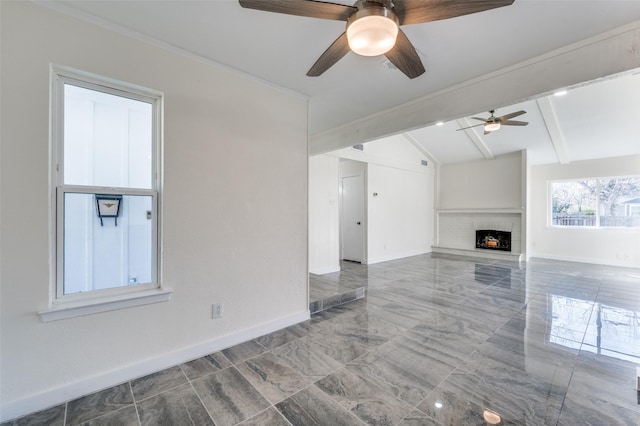 unfurnished living room featuring ceiling fan, vaulted ceiling with beams, and a fireplace