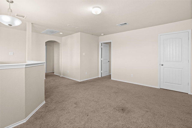 unfurnished room featuring carpet floors