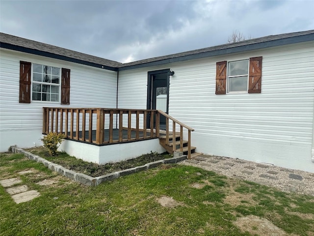 doorway to property with a deck