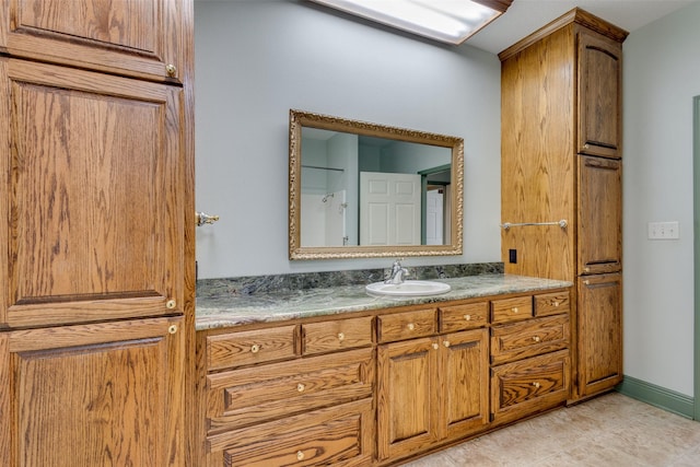 bathroom featuring vanity and tile patterned floors