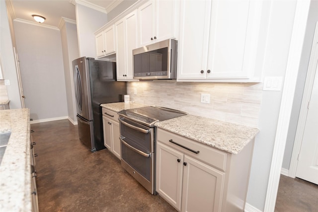 kitchen with appliances with stainless steel finishes, tasteful backsplash, white cabinets, light stone counters, and crown molding