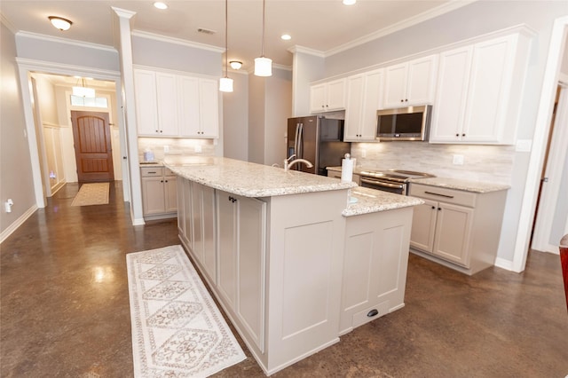 kitchen featuring stainless steel appliances, white cabinetry, and a kitchen island with sink