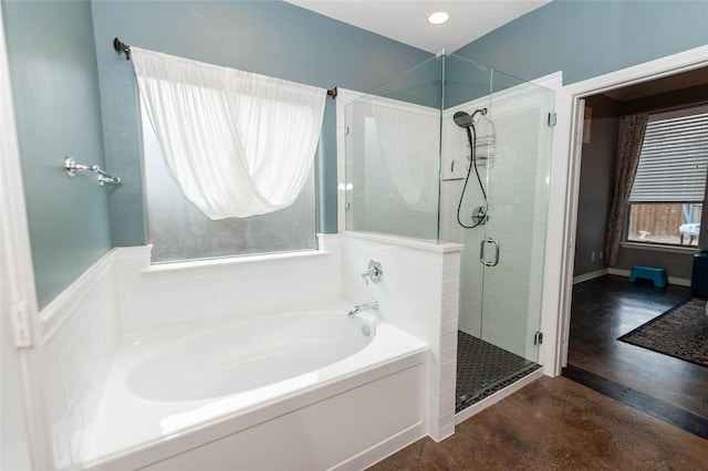 bathroom with concrete flooring and plus walk in shower