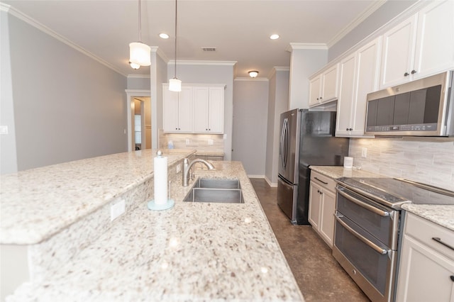 kitchen with sink, light stone countertops, white cabinets, and appliances with stainless steel finishes