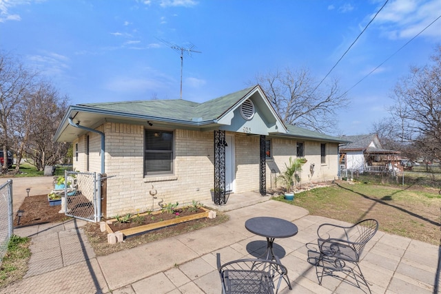 view of front of house featuring a patio