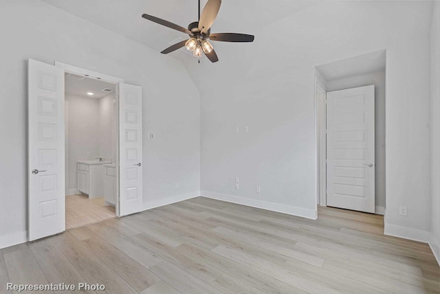 spare room with ceiling fan and light hardwood / wood-style floors