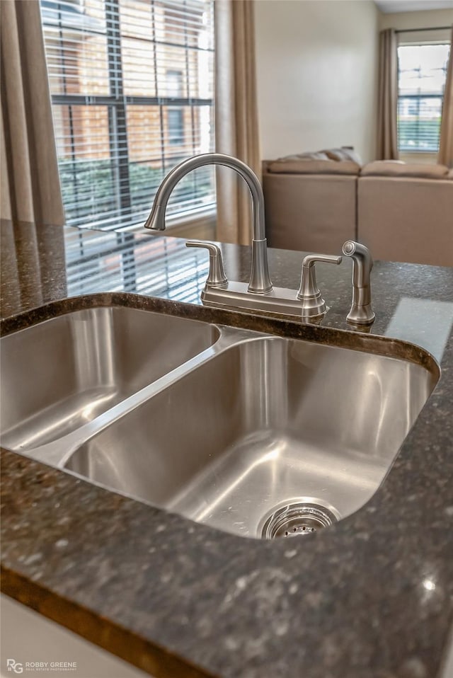 interior details with sink and dark stone counters