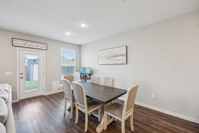 dining area with dark wood-type flooring, recessed lighting, and baseboards