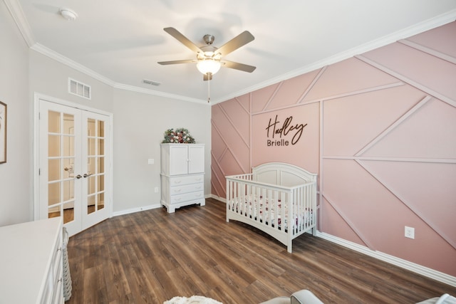 bedroom featuring visible vents, ornamental molding, dark wood finished floors, and french doors