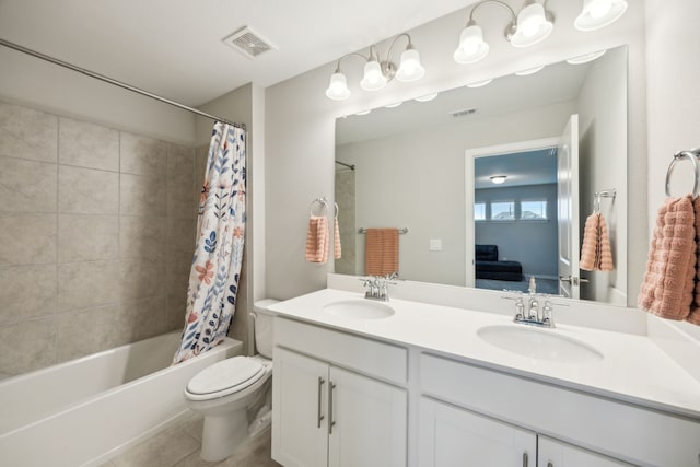 bathroom with ensuite bath, a sink, and visible vents