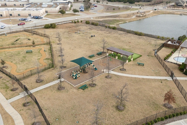 bird's eye view with a water view