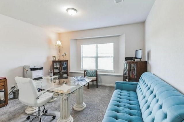 home office featuring carpet floors, baseboards, and visible vents