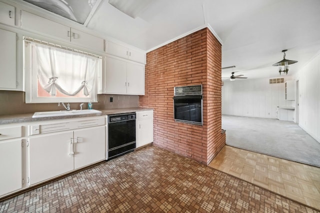 kitchen featuring sink, ceiling fan, white cabinetry, ornamental molding, and black appliances