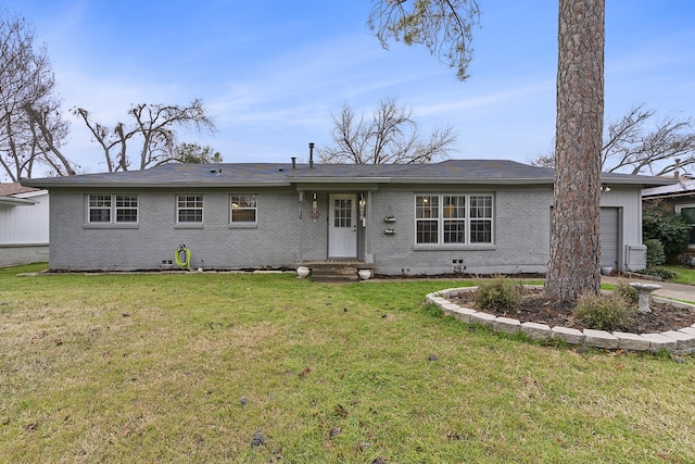 ranch-style home with a garage and a front yard