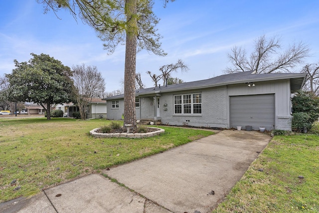 single story home featuring a garage and a front yard