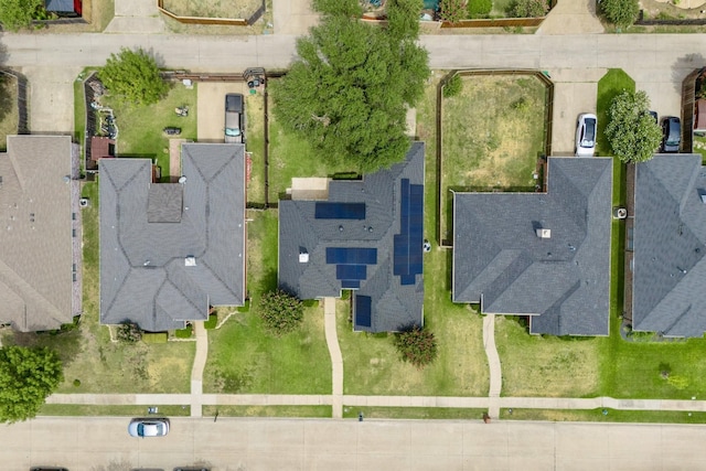 birds eye view of property with a residential view