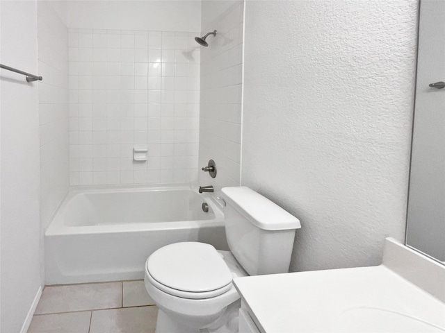 6416 Texas Cowboy Dr, Fort Worth, TX 76123 - bathroom with toilet, vanity, tile patterned floors, shower / washtub combination, and a textured wall