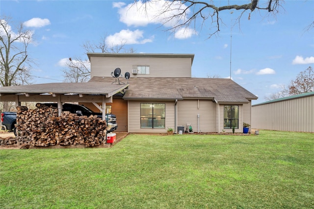 back of house with a lawn